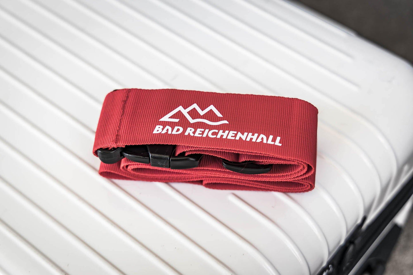 Rotes Kofferband mit Bad Reichenhall Logo
